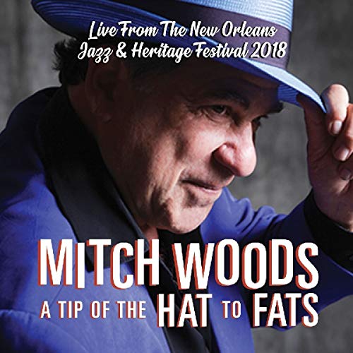 "CD cover featuring a man in a blue suit and hat, tipping his hat."
