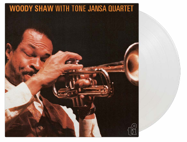 Woody Shaw playing trumpet, album cover with a white vinyl record.