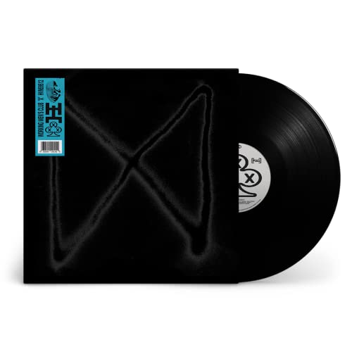 Black vinyl record with embossed “X” design and blue hype sticker.
