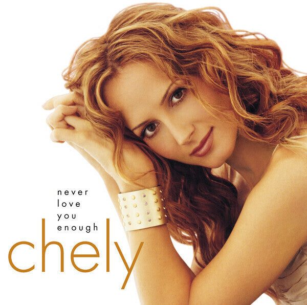 CD cover featuring Chely Wright with long wavy brown hair.