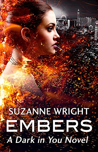 Book cover: woman’s face dissolving into fiery embers, city skyline backdrop.