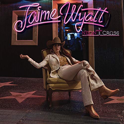 Jaime Wyatt album cover featuring a woman in a white suit and cowboy hat.