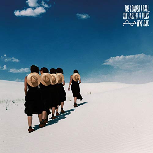 Album cover: group walking in a white, sandy landscape.