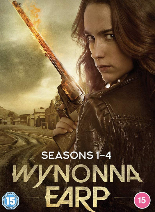 Wynonna Earp holding a flaming revolver against a Western town background on DVD cover.