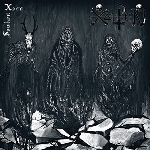 Dark album cover featuring ghostly figures and skull imagery.