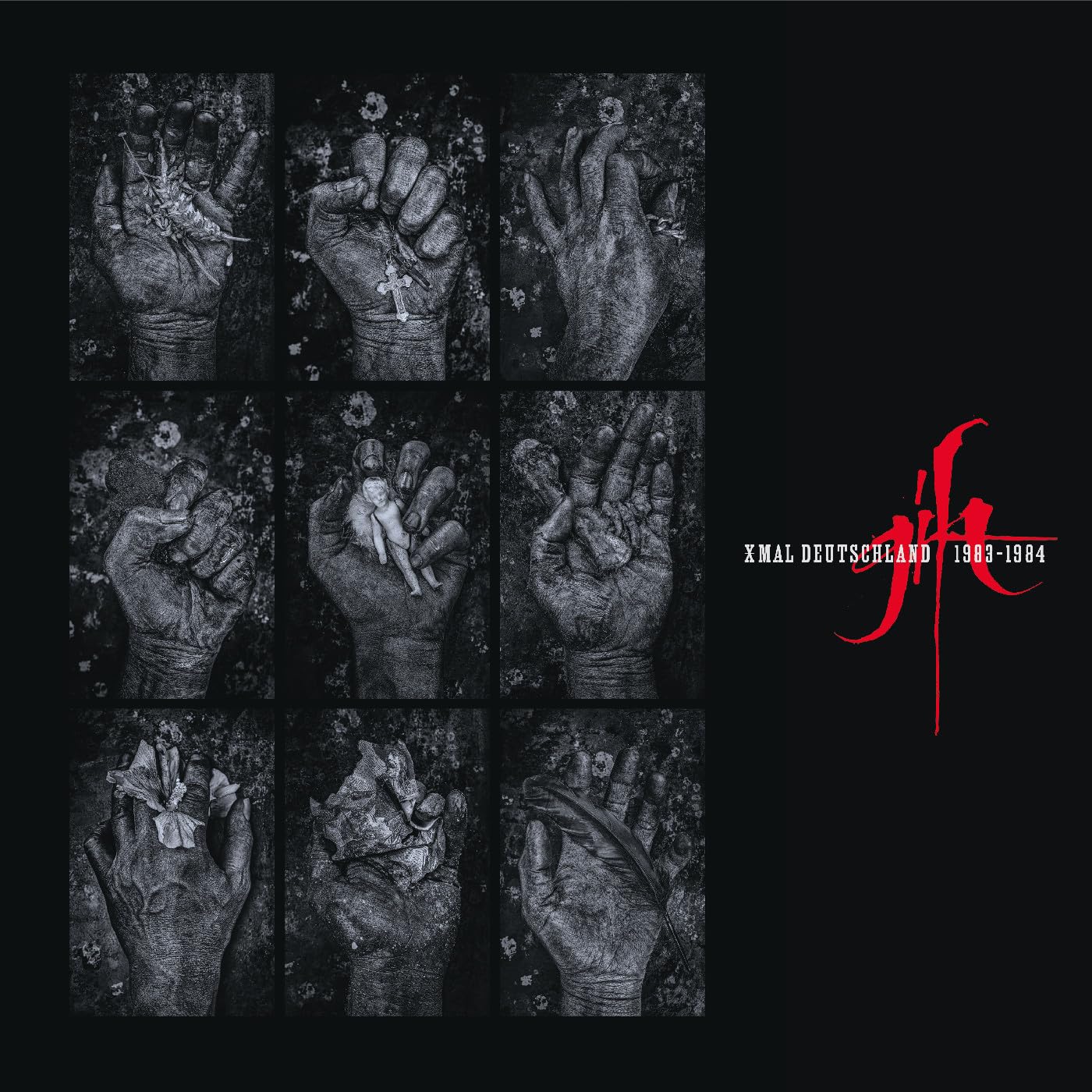 Black and white album cover with nine hands and a small doll.