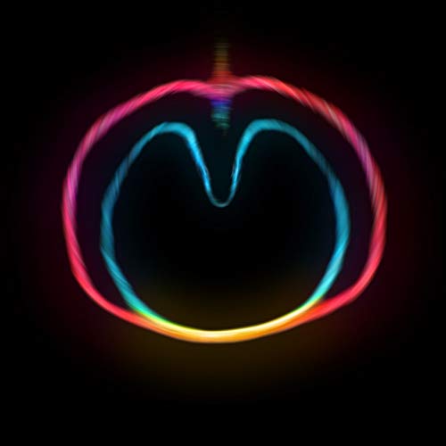 Colorful abstract light painting resembling a wasp on black background.