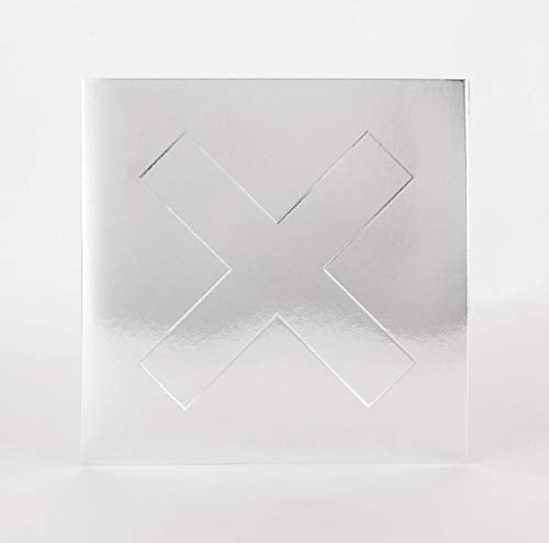 Silver vinyl record cover with embossed "X" design.