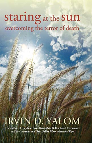 Book cover showing tall grass against a bright sun and blue cloudy sky.