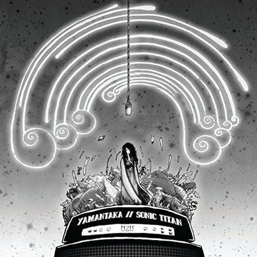 Black and white album cover with a woman surrounded by chaos on a speaker.