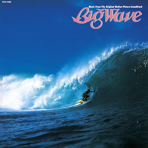 A surfer rides a large blue ocean wave under the text Big Wave.
