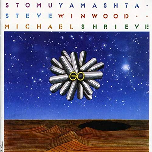CD cover for "Yamashta Stomu - Go" featuring abstract silver and gold shapes.