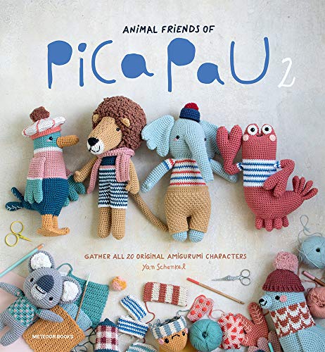 Book cover featuring various crocheted amigurumi animal characters and craft supplies on a surface.