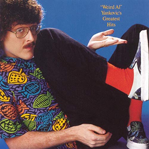 “Weird Al” Yankovic album cover featuring him in a colorful shirt.