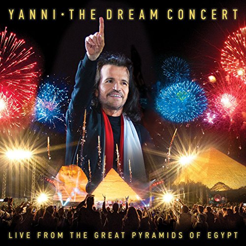 Yanni album cover featuring fireworks, pyramids, and a raised hand.