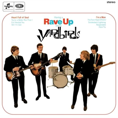 Yardbirds album cover: four musicians in suits with instruments.