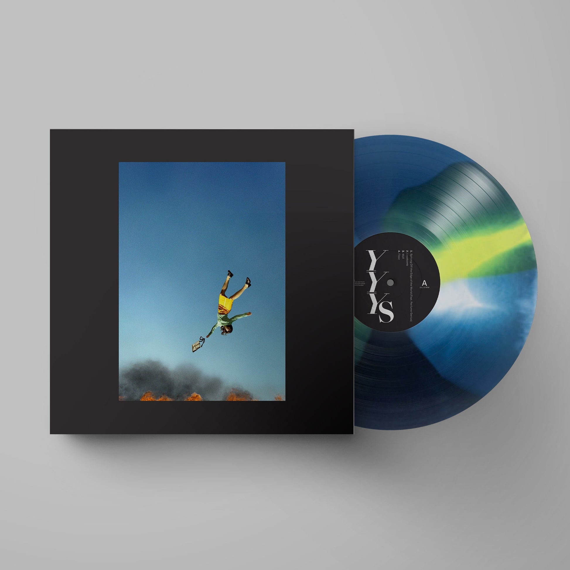 Yeah Yeah Yeahs vinyl record with colourful swirl and falling figure cover.