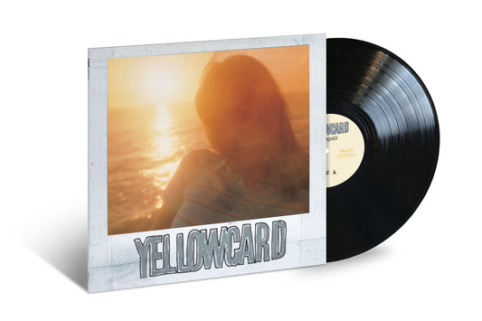 Yellowcard's "Ocean Avenue" 20th Anniversary vinyl record with a sunlit cover.
