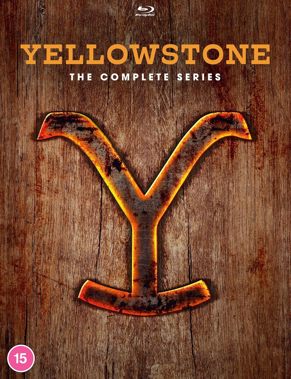 Yellowstone" Blu-ray cover featuring a rustic, metal "Y" on woodgrain.