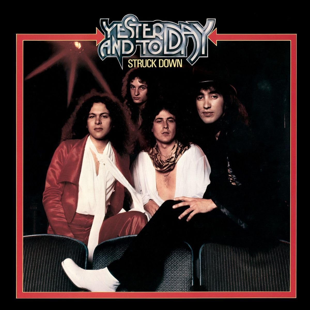 Album cover for "Yesterday & Today - Struck Down" featuring a band portrait.