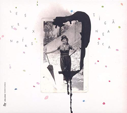 Black and white photo of a woman with umbrella, surrounded by abstract text and paint.