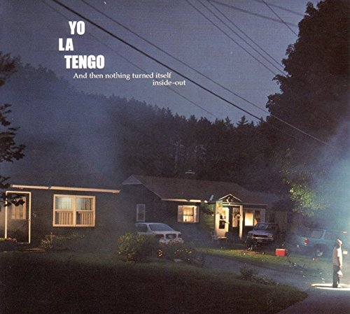 Yo La Tengo album cover: a dark, misty suburban house scene.