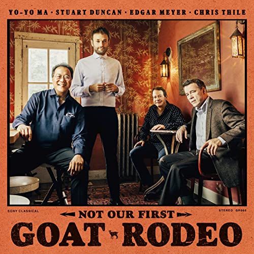 CD cover featuring four musicians in a rustic interior setting.