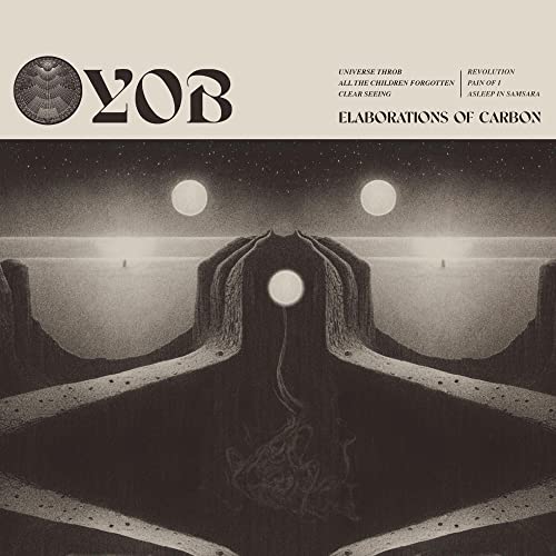 Yob album cover: desolate landscape with moons, dark and atmospheric.