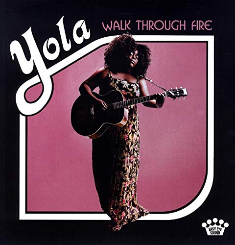 The image shows a woman playing guitar on a vinyl album cover, titled "Yola - Walk Through Fire".