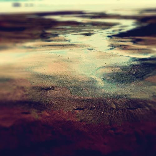 CD cover for Yorke Loula’s “Hydrology” featuring abstract, textured water reflection.