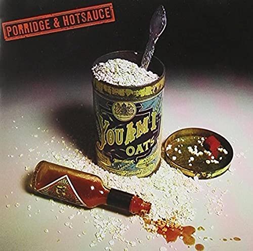 CD cover: oats container, hot sauce bottle, and spilled sauce on textured surface.