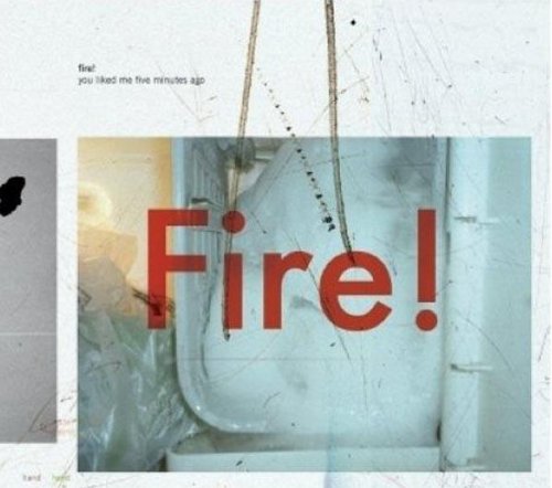 A close-up photo of pipes with the word Fire! superimposed in red letters.