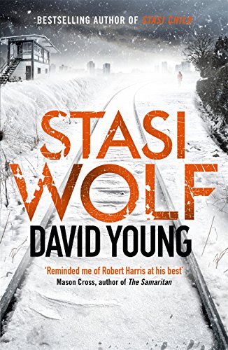 Book cover: "Stasi Wolf" by David Young, snowy landscape, train tracks.