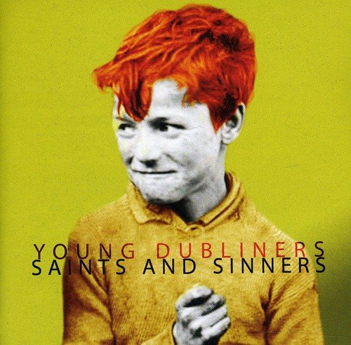 CD cover: portrait of a young man with red hair on yellow background.