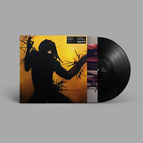 Young Fathers "Heavy Heavy" vinyl record with silhouette cover art.