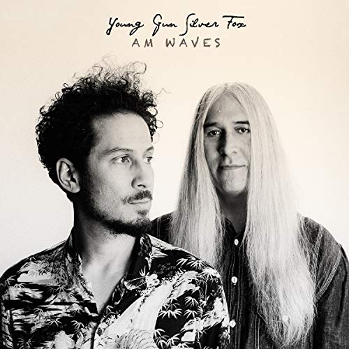 Album cover for Young Gun Silver Fox’s “AM Waves” featuring two men.