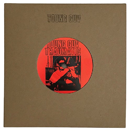Brown vinyl record sleeve with red circular label featuring a man in sunglasses.