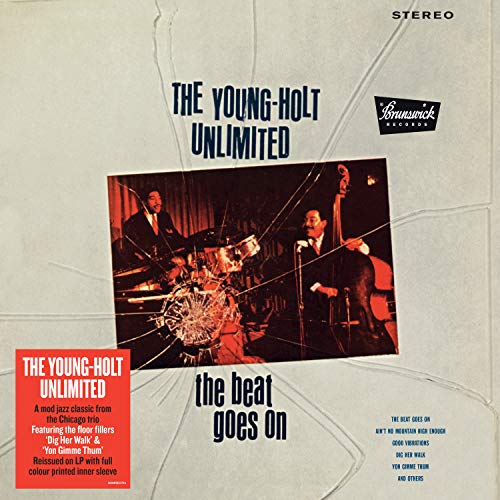 Album cover for “The Beat Goes On” by Young Holt Unlimited, featuring a jazz trio.