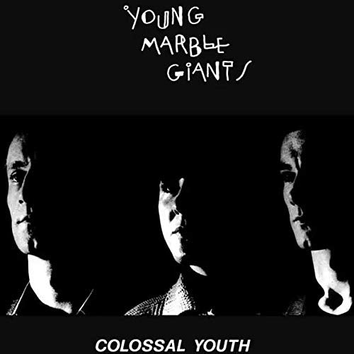 Black and white album cover featuring three shadowed faces and band name.