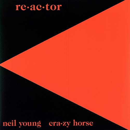 The image shows a vinyl record cover with a black background and an orange parallelogram.