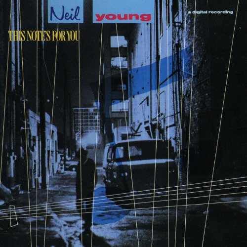Neil Young album cover: a dark city street with vertical lines.