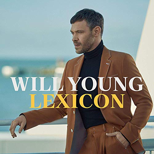 Man in brown suit stands outdoors with text "Will Young Lexicon" overlaid.