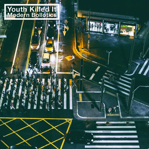 CD cover: aerial view of a busy city street at night.