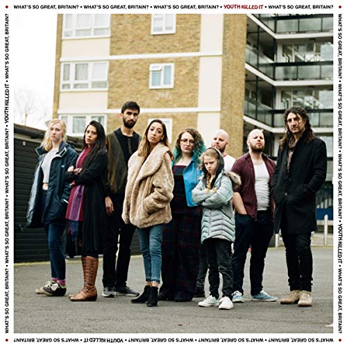 CD cover: Group of people standing in front of a concrete building.