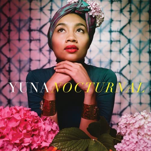 CD cover featuring Yuna, flowers, and patterned pink background.