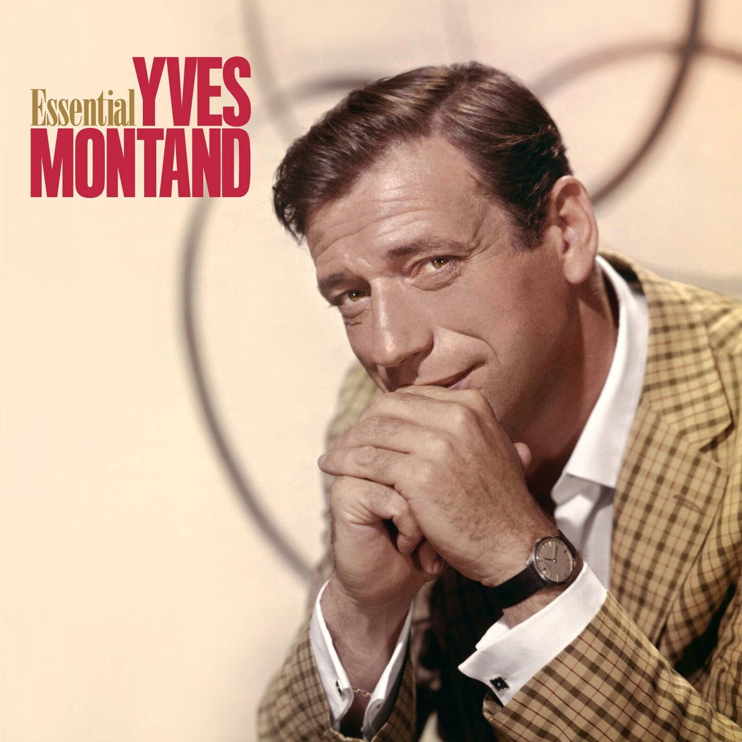 Yves Montand portrait on album cover, wearing a patterned jacket.