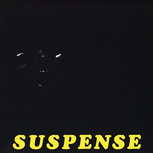 CD cover for "Suspense" with a dark, shadowy figure and yellow text.
