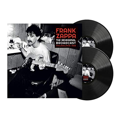Frank Zappa vinyl record set with black covers and a portrait.