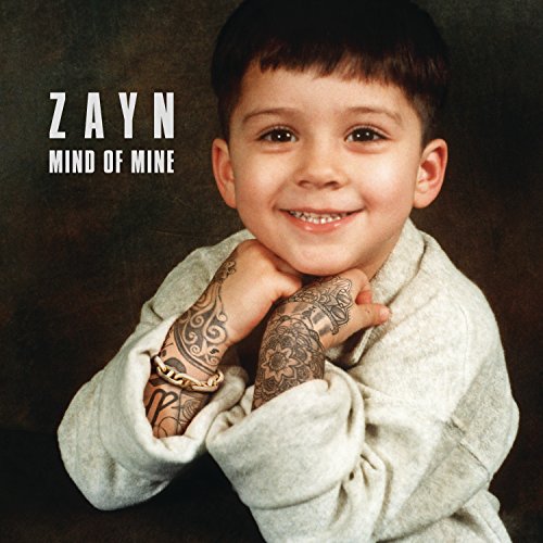 Album cover for Zayn’s “Mind of Mine” featuring a young boy and tattoos.