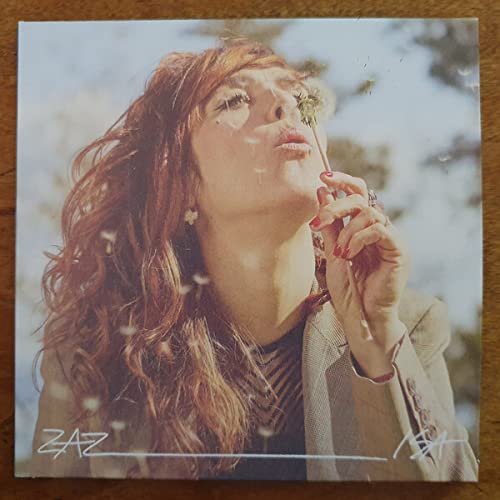 CD cover featuring a woman with long hair blowing a dandelion.